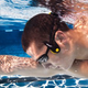 Illustration for article titled Listen To Music Through Your Cheekbones While You Swim Laps